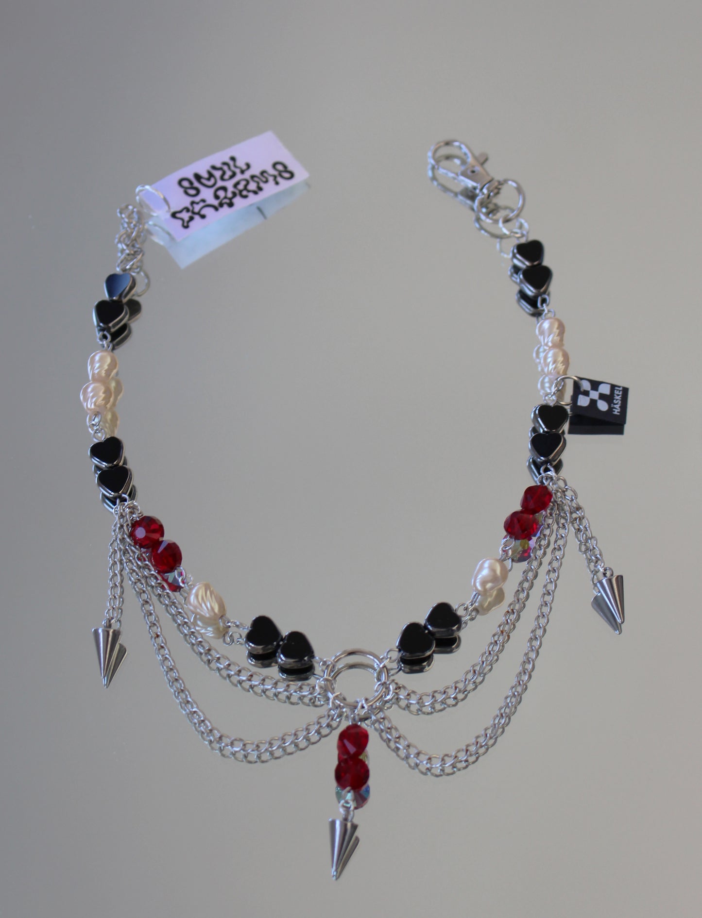 A AABRED SPIKES NECKLACE