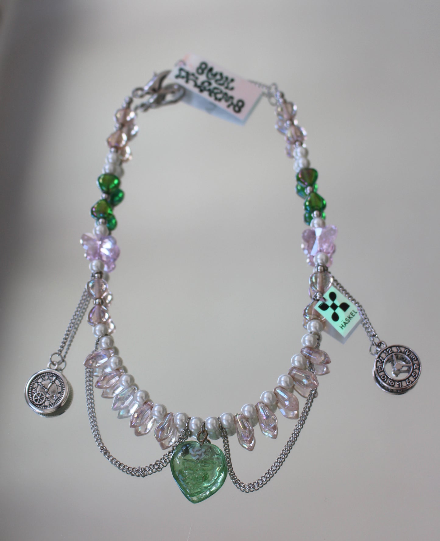 A BI CLOCK FLIES PINK NECKLACE