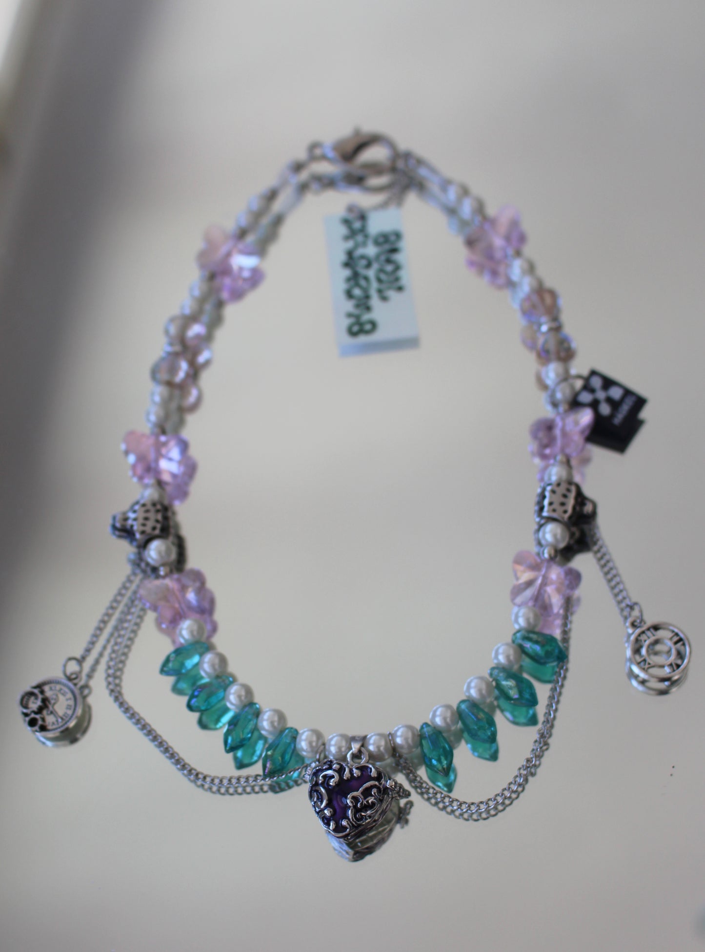 A GUEPARD CLOCK NECKLACE