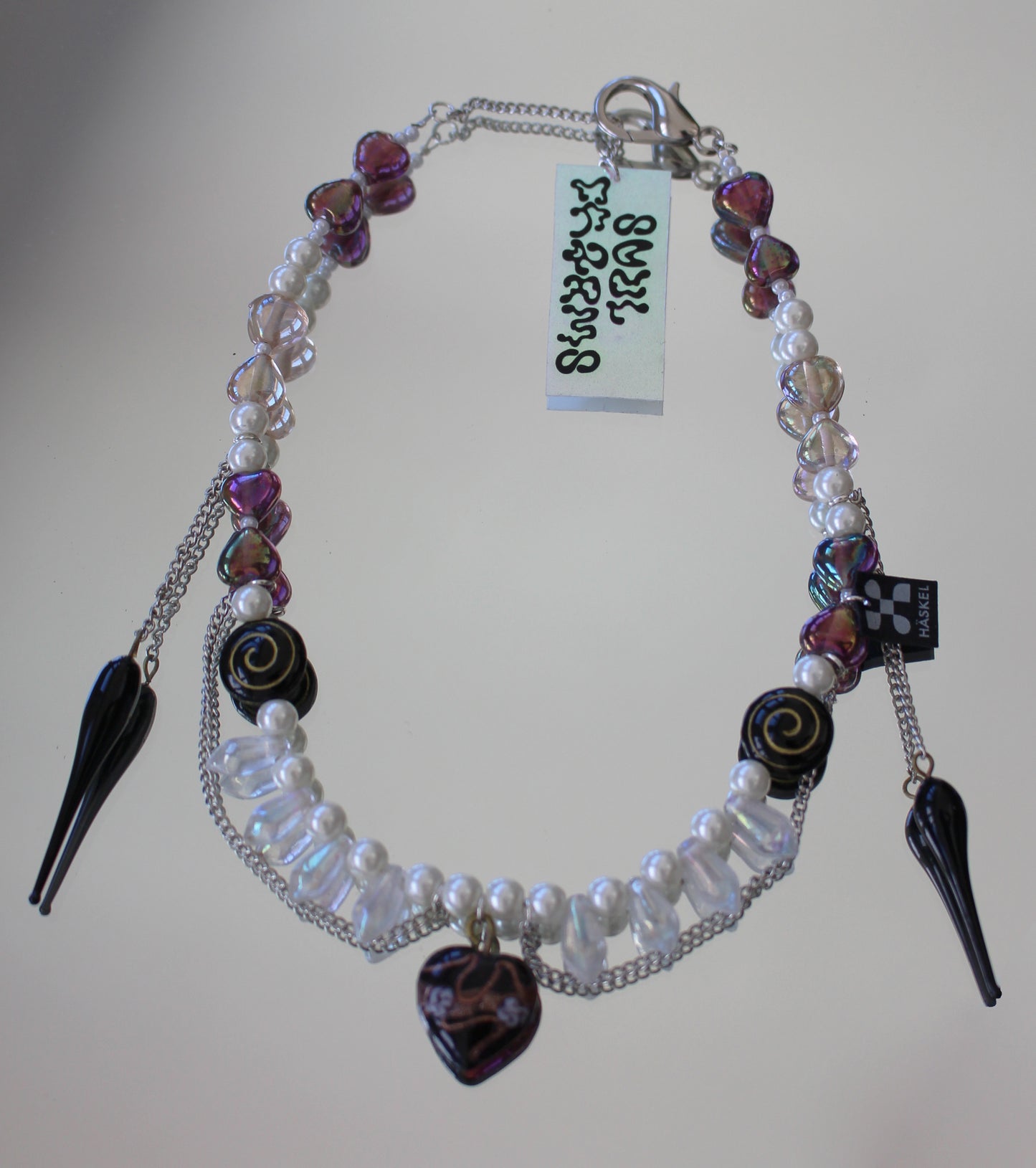 A BLACK HEART NECKLACE
