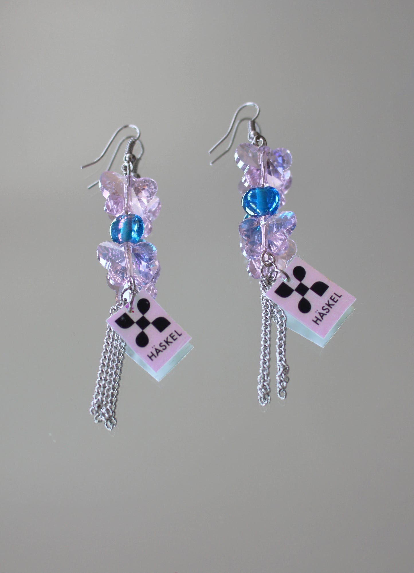 A BI BUTTERFLY BLUE EARRING