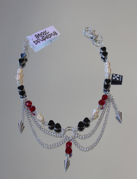 A AABRED SPIKES NECKLACE