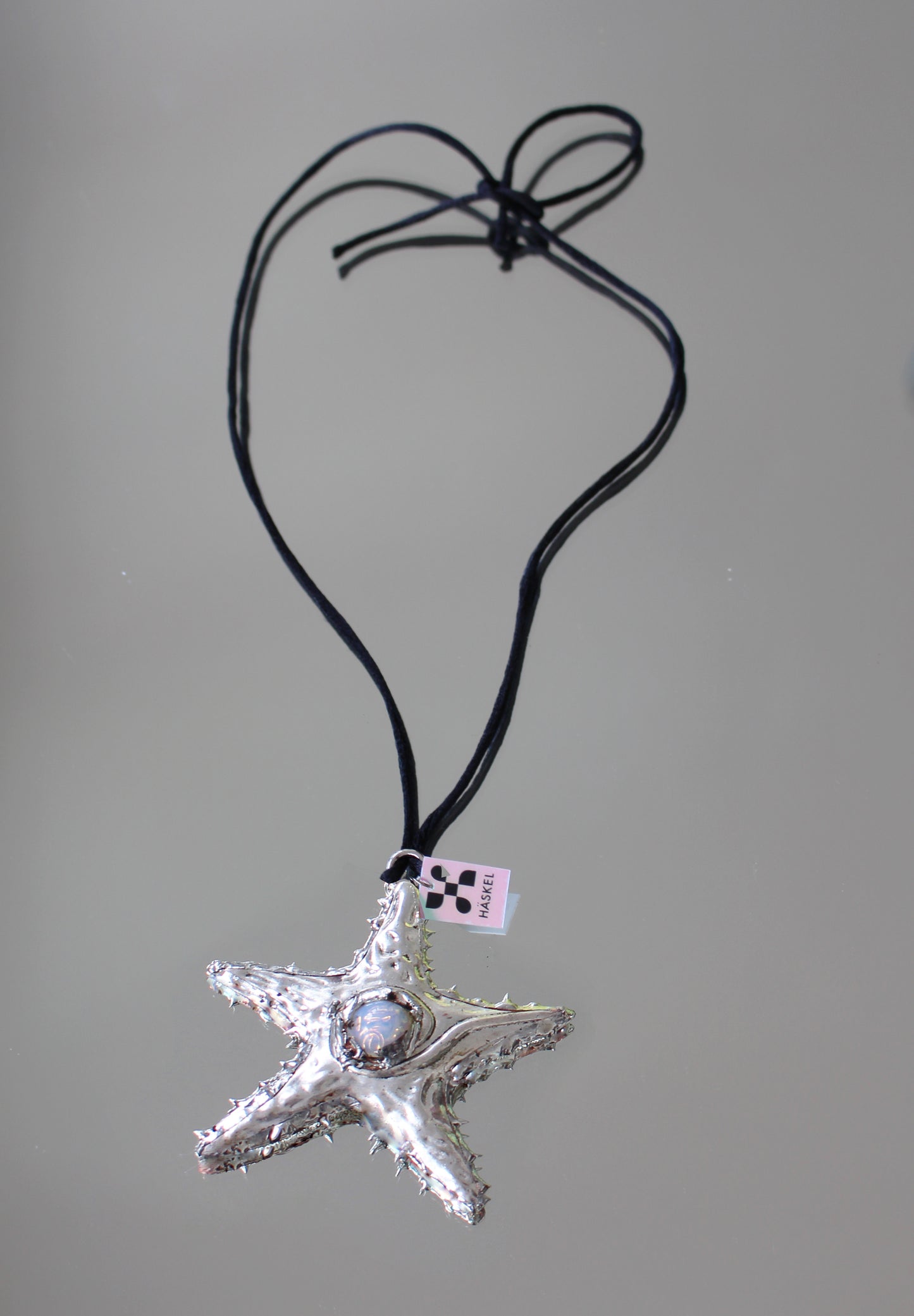 A AB ALACE STARFISH SIKES MILCH  NECKLACE