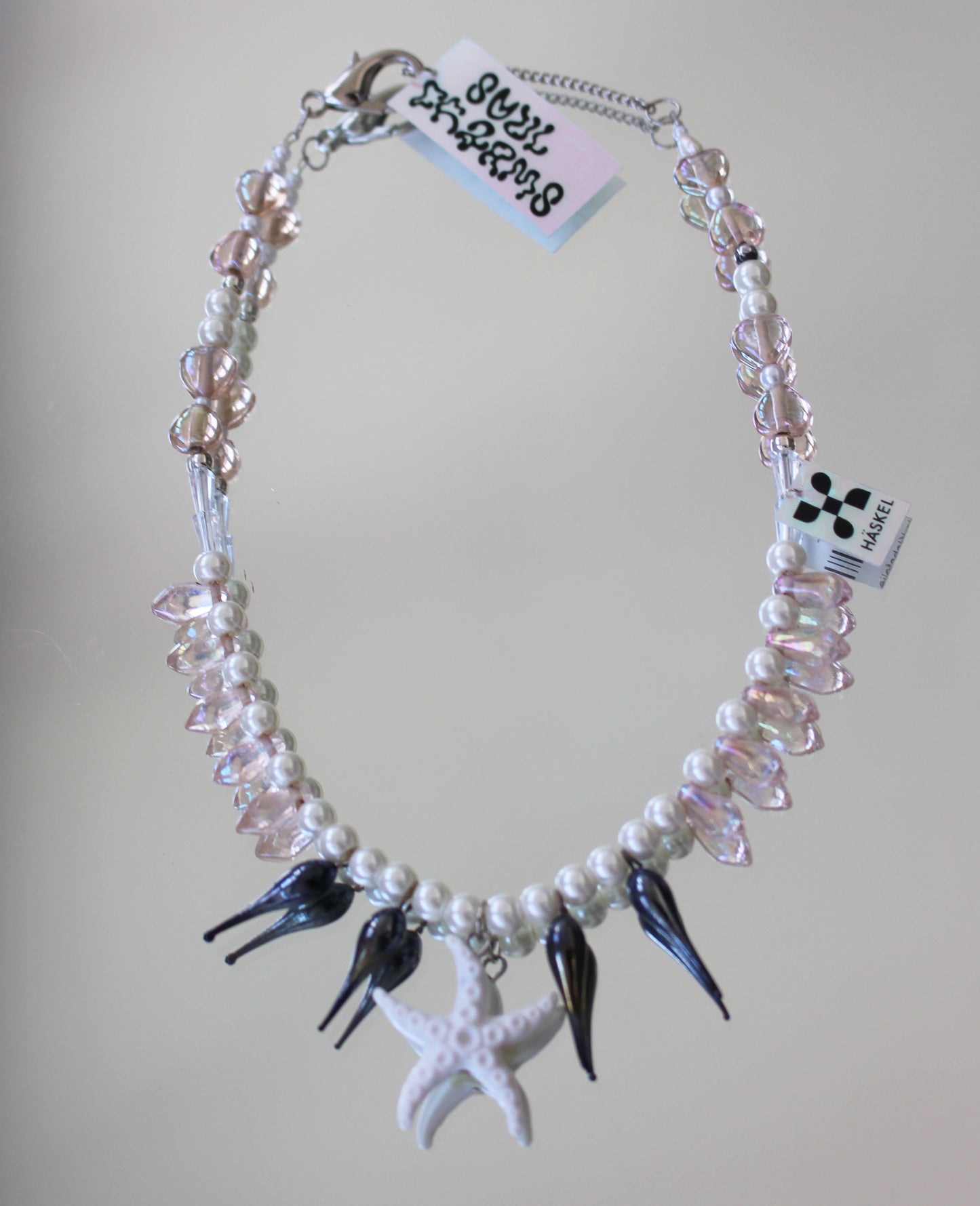 A FISH STAR NECKLACE
