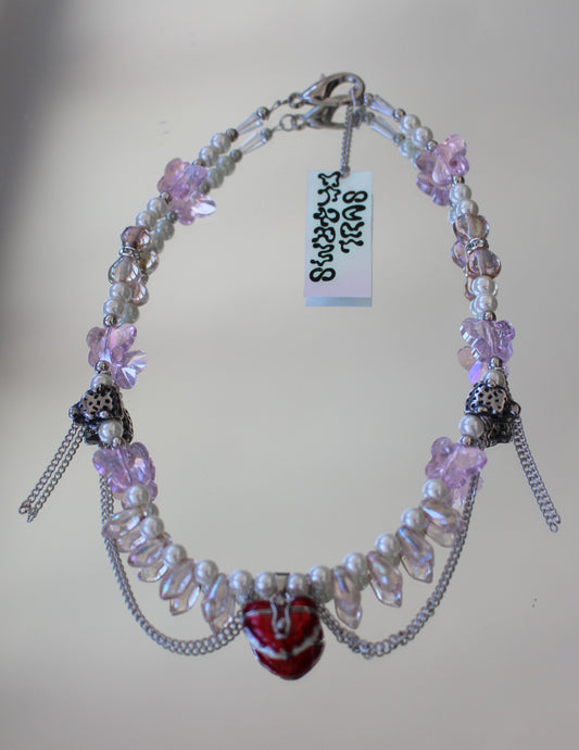 A GUEPARD LOCKET NECKLACE