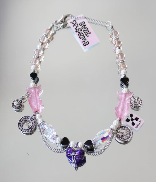 A PRESENT O`CLOCK PURPLE NECKLACE