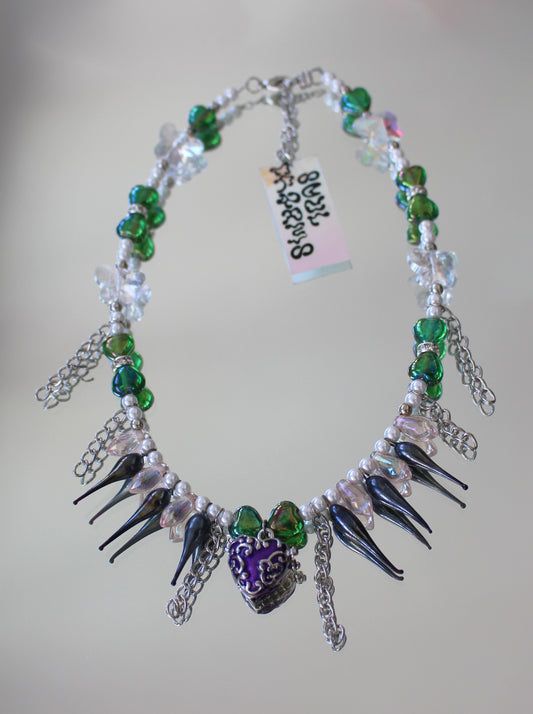 A THREE ARRIMA NECKLACE