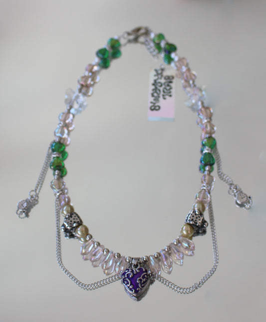 A THREE ARRIMA HEART NECKLACE