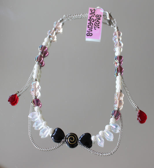 A BRIGHT RED NECKLACE