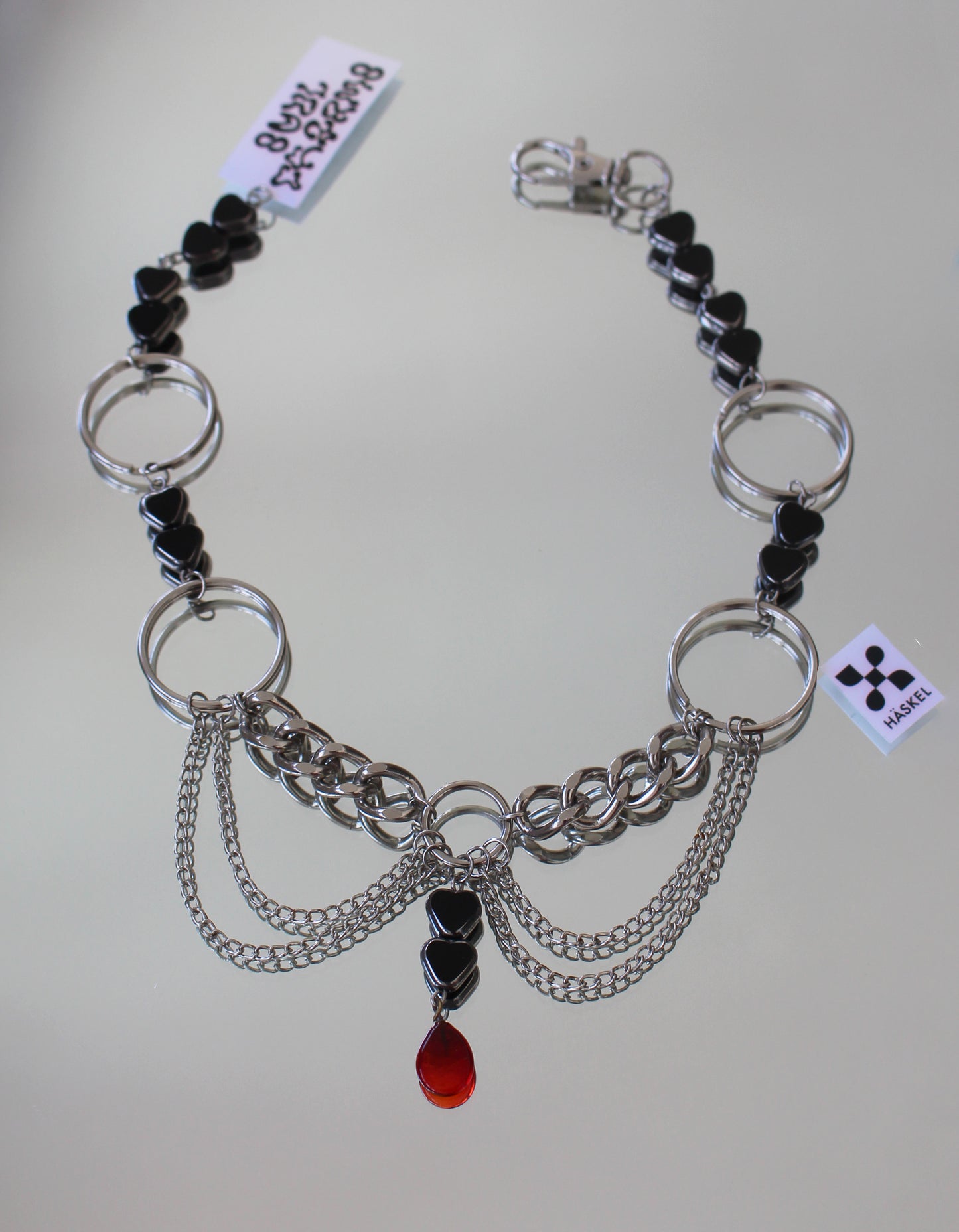 A AB ASCHOKER IN RED
